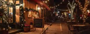 a cozy coffee shop decorated with festive lights and a chalkboard sign promoting holiday specials stands out in a bustling neighborhood street.